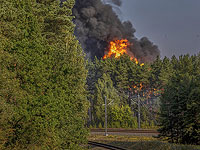 На окраине Вильнюса загорелись вагоны-цистерны со сжиженным газом