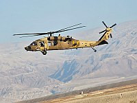 Пожарные и военные спасатели спасли туристов с высокой скалы