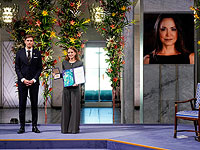 Дочь лауреата Нобелевской премии мира, Ана Корина Соса, принимает награду своей матери, лидера венесуэльской оппозиции Марии Корины Мачадо. Осло, Норвегия Дочь лауреата Нобелевской премии мира, Ана Корина Соса, принимает награду своей матери, лидера венесуэльской оппозиции Марии Корины Мачадо. Осло, Норвегия