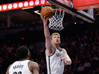 НБА. Денни Вульф набрал 5 очков и сделал 6 подборов. 