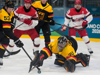 Олимпиада. Хоккей. Победы сборных США и Германии