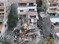 Под завалами обрушившегося дома в Хайфе могут находиться люди. Видео места падения ракеты, снятое с дрона