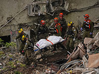 Из-под завалов извлечены тела еще двоих погибших при падении ракеты в Хайфе