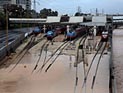 Снег и поваленные деревья стали причиной пробок на дорогах и отмены поездов