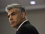Демонстрантов забросали яйцами у дома Лапида