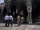 Сторонники Мухаммада Мурси атаковали и подожгли ряд с помощью бутылок с зажигательной смесью ряд правительственных зданий в каирском районе Гиза