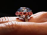 самый крупный в мире голубой бриллиант круглой формы весом 7,59 карата. 9 сентября 2013 года