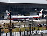 Самолеты авиакомпании Malaysian Airlines в аэропорту Куала-Лумпура.  08.03.2014