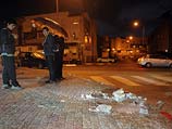 На месте падения одной из ракет. 12 марта 2014 года