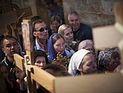 Христианские паломники в Иерусалиме ожидают схождения Благодатного огня