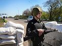 Украинские власти: Славянск будет блокирован,  террористы - уничтожены