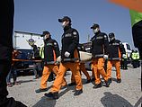  	Полиция арестовала всех моряков с Sewol. Обнаружены 187 тел погибших
