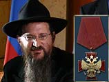 Путин наградил главного раввина России Берла Лазара орденом в форме креста
