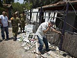 Место попадания в жилой дом в Йегуде. 22 июля 2014 года