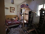 Попадание ракеты в дом. 27 июля 2014 года