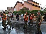 На месте взрыва ракеты в Кирьят-Гате. 31 июля 2014 г.