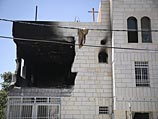 Дом семьи Амара Абу Аиша, частично разрушенный израильскими военными в ночь на 1 июля 2014 года