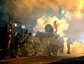 В Фергюсоне обстреливают полицию, задержаны свыше 30 человек