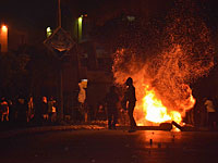 Возобновились беспорядки в Рахате: город затянул дым от горящих покрышек