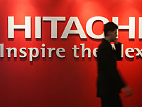 Компания Hitachi выпускает прибор, способный измерить уровень счастья коллектива
