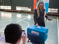 Израильтяне выбирают 20-й Кнессет. Фоторепортаж