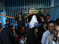 Массовая свадьба в Газе: 200 пар под проливным дождем
