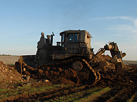 Бульдозерист, задавивший на пляже Олега Райхлина, выплатит его семье 1,6 млн шекелей