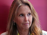 Шери Арисон продала часть акций банка 