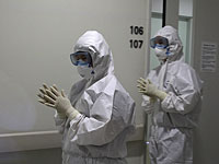 Сотрудники медицинского центра в Сеуле