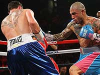 Бокс: Мигель Котто защитил титул чемпиона мира, нокаутировав Дэниэла Гилла