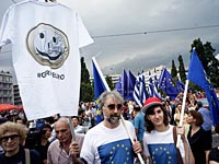 Греция считает последние евро. Фоторепортаж