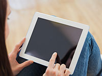 Учащиеся 1800 школ в будущем году начнут работать с электронными учебниками