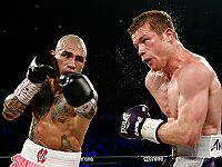 Бокс: Альварес победил Котто. Абрахам защитил титул