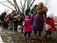 UNICEF: Треть беженцев, прибывающих в Европу, - дети