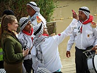 Крещение в реке Иордан: паломники из России, арабские скауты и девушка из ЦАХАЛа