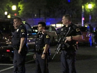 Предполагаемый снайпер заявил, что центр Далласа заминирован