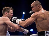 Бои в Берлине: де Каролис сохранил титул.