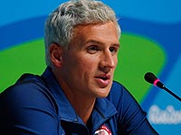 НОК США подтвердил: Райан Лохте ограблен бандитами, переодетыми в полицейскую форму