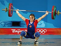 Российские тяжелоатлетки лишены серебряной и бронзовой медалей Пекинской олимпиады