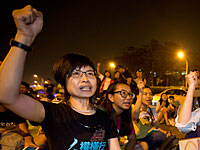 Демонстрация китайцев в центре Парижа: участники требуют защиты от преступников