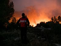 Лесной пожар около поселка Халамиш:  эвакуированы около 200 семей, сгорели не менее 10 домов