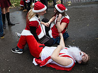 Santacon: нашествие Санта-Клаусов в Лондоне. Фоторепортаж