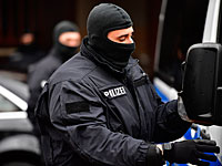 Полиция окружила магазин в Дюссельдорфе, где находится предполагаемый виновник теракта
