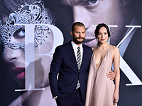 Джейми Дорнан и Дакота Джонсон на премьере фильма 