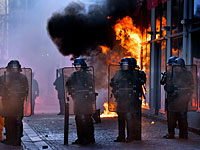 Беспорядки в центре Парижа: профсоюзы против Ле Пен и Макрона