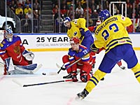 Россияне в серии буллитов победили шведов. Финны обыграли белорусов