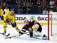 Канадцы с трудом одолели французов. Шведы победили сборную Латвии