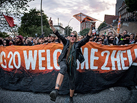 Огонь и вода в Гамбурге: беспорядки на фоне саммита G20. Фоторепортаж