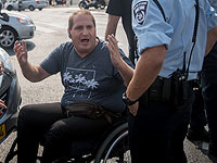 Борцы за права инвалидов перекрыли улицу Дерех а-Шалом в Тель-Авиве