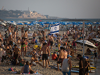 Сотни тысяч израильтян празднуют Суккот на природе